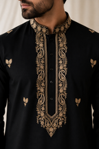 Close-up of gold embroidered placket and collar on MEHFIL kurta
