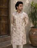 Man wearing light gold floral jacquard kurta - front view