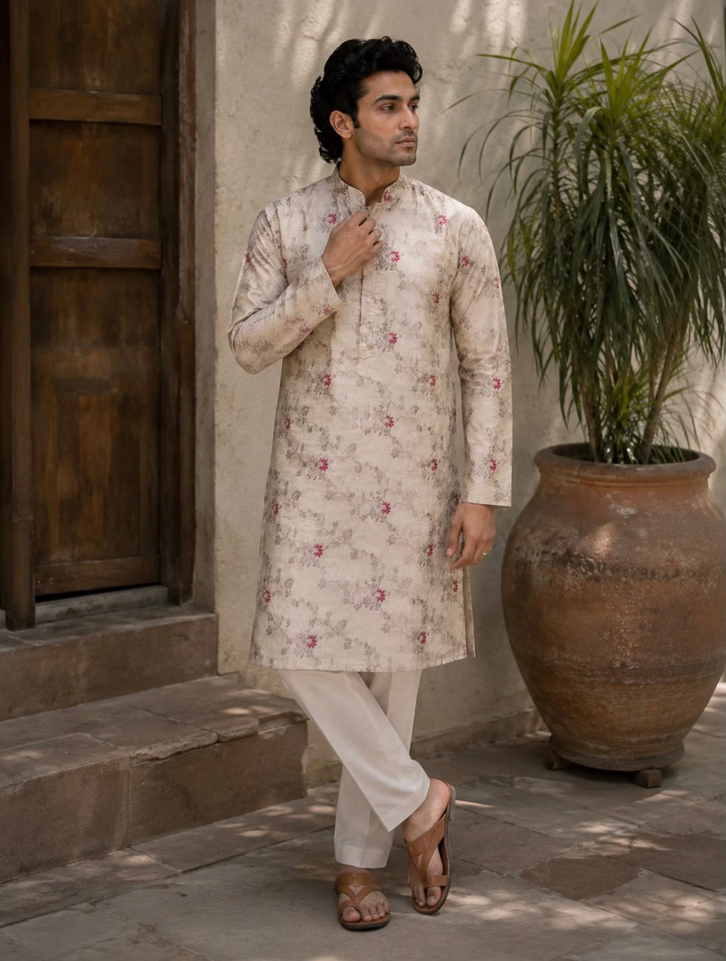 Man wearing light gold floral jacquard kurta - styled pose