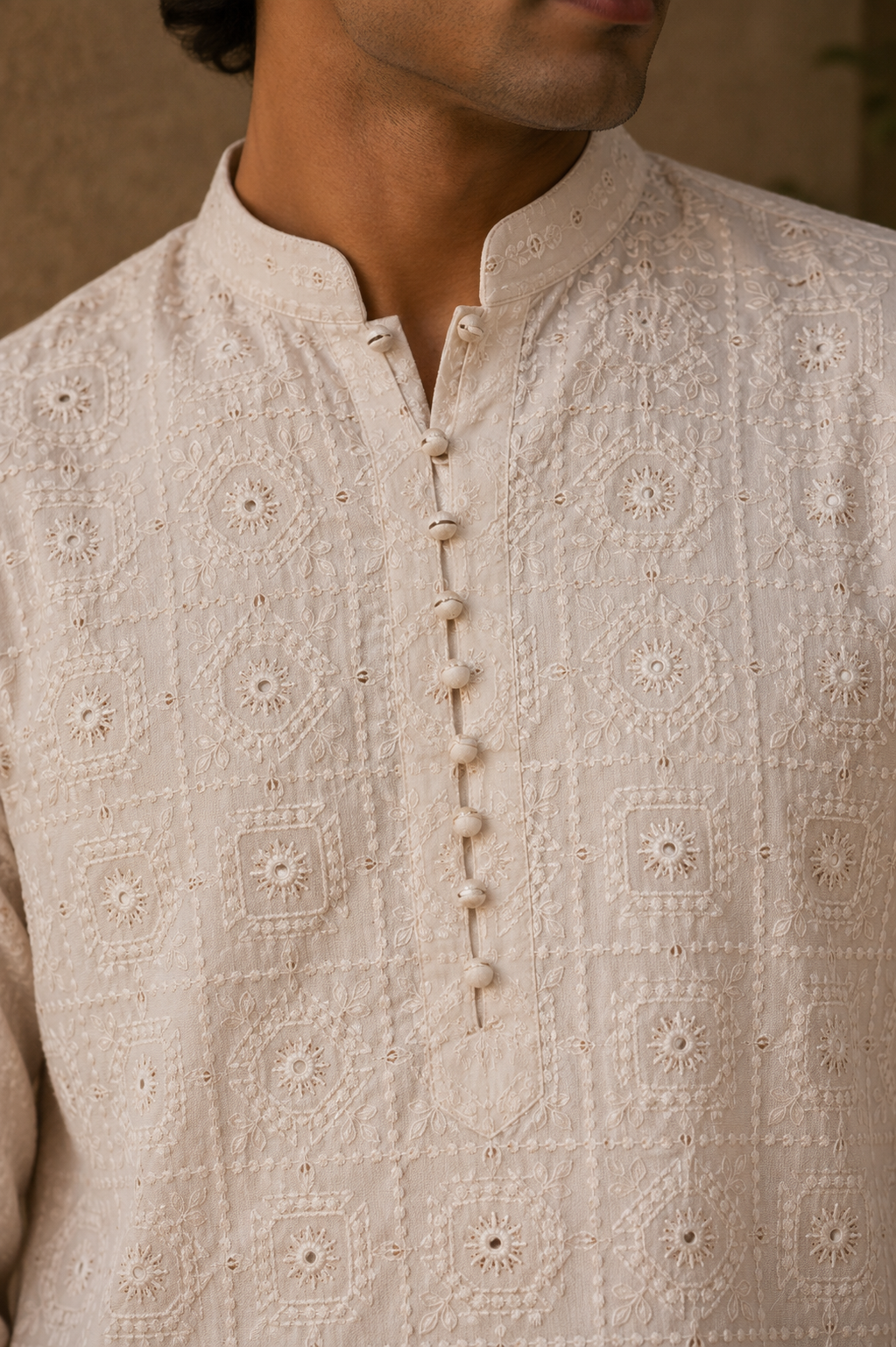 Close-up of embroidery detail on SHEESH MAHAL kurta