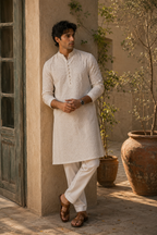  Men's festive kurta styled with matching trousers